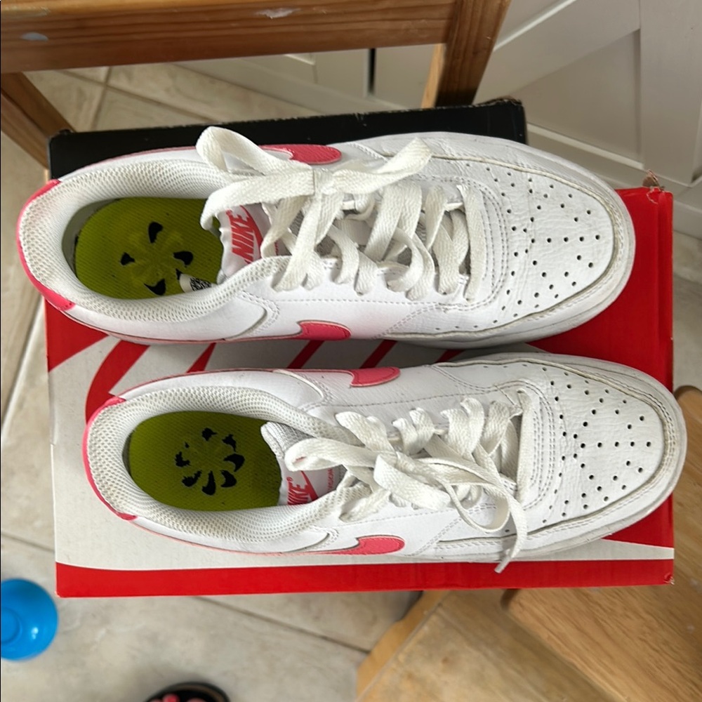 Nike White and Pink Athletic Shoes with Smooth Leather and Breathable Design